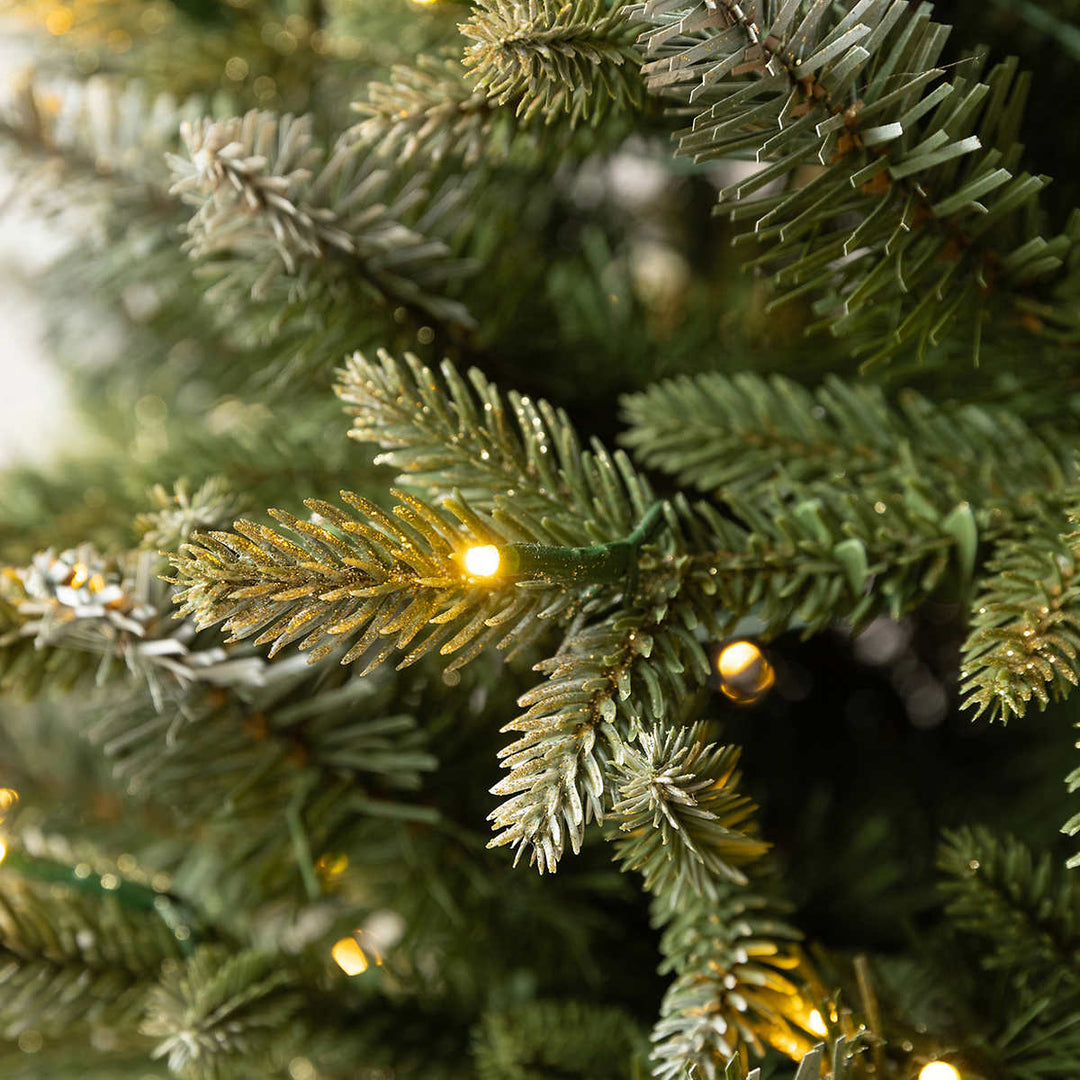 Aspen Pre-Lit Potted Artificial Christmas Tree with Color-Changing Radiant Micro LED Lights - 4 ft