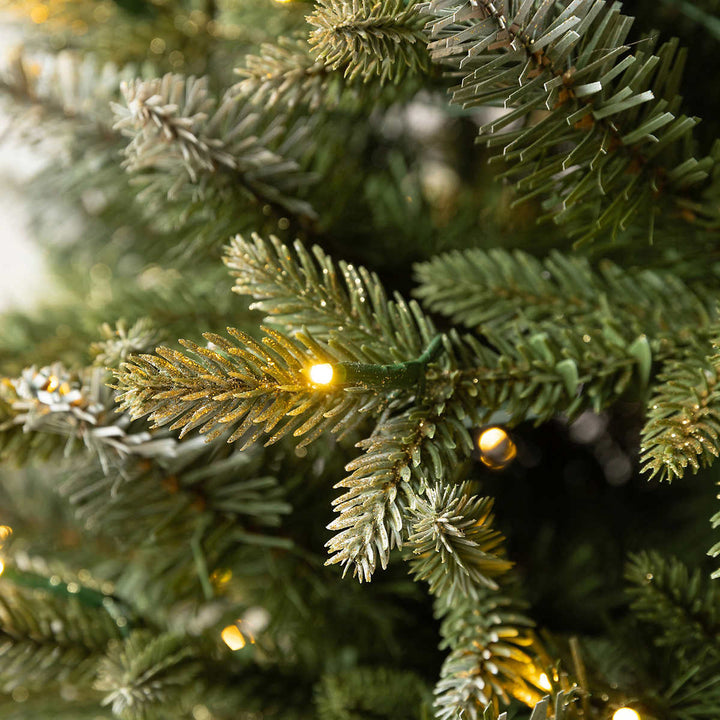 Aspen Pre-Lit Potted Artificial Christmas Tree with Color-Changing Radiant Micro LED Lights - 4 ft