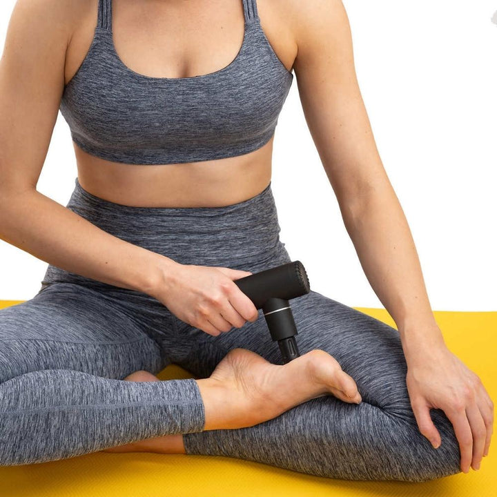 Lolë - Appareil de massage à percussion avec 4 têtes de massage interchangeables