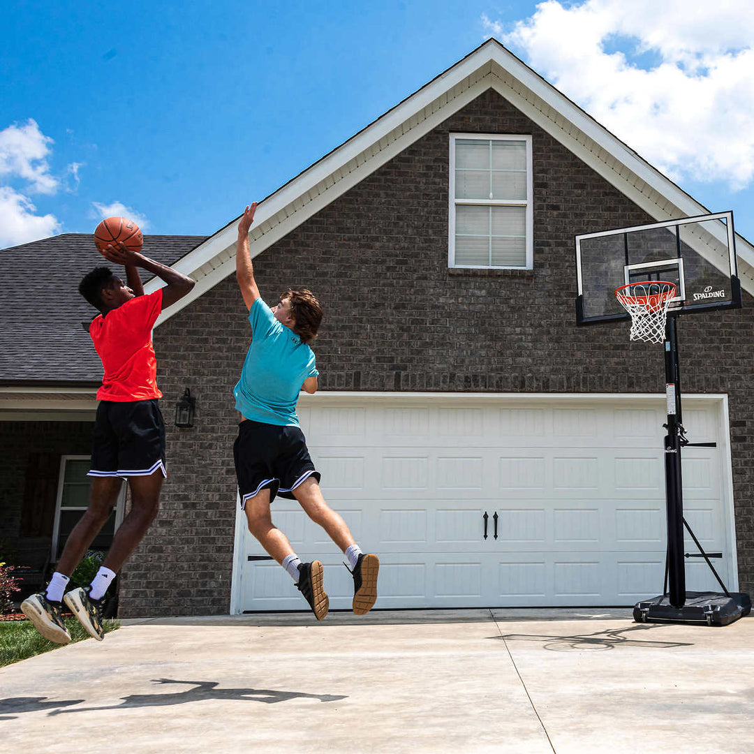Spalding 54" Accuglide Polycarbonate Portable Basketball System